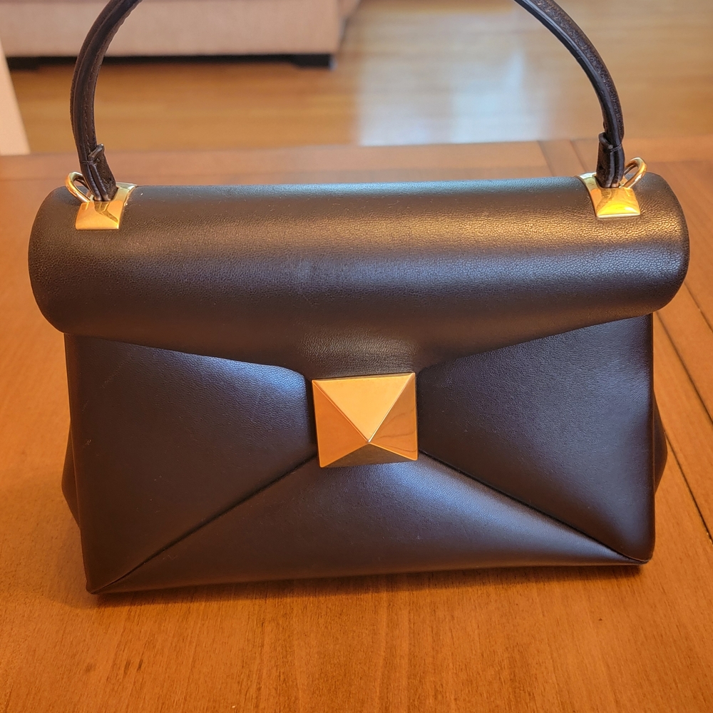 Elegant Black and Gold Women's Handbag
